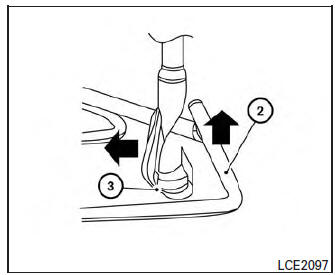 Nissan Micra. Reinstalling the temporary spare tire to its original position