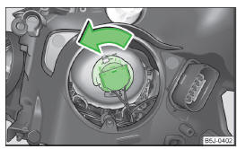 Fig. 156 Removing bulbs for low beam/ low and main beam