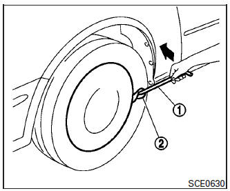 Nissan Micra. Removing wheel cover